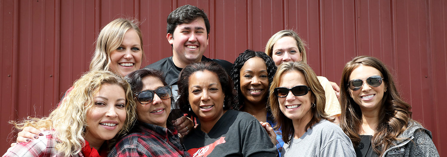 Group of people smiling for the camera