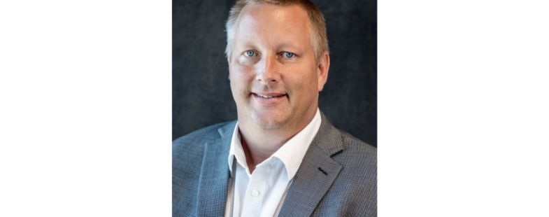 Man poses for a professional photograph