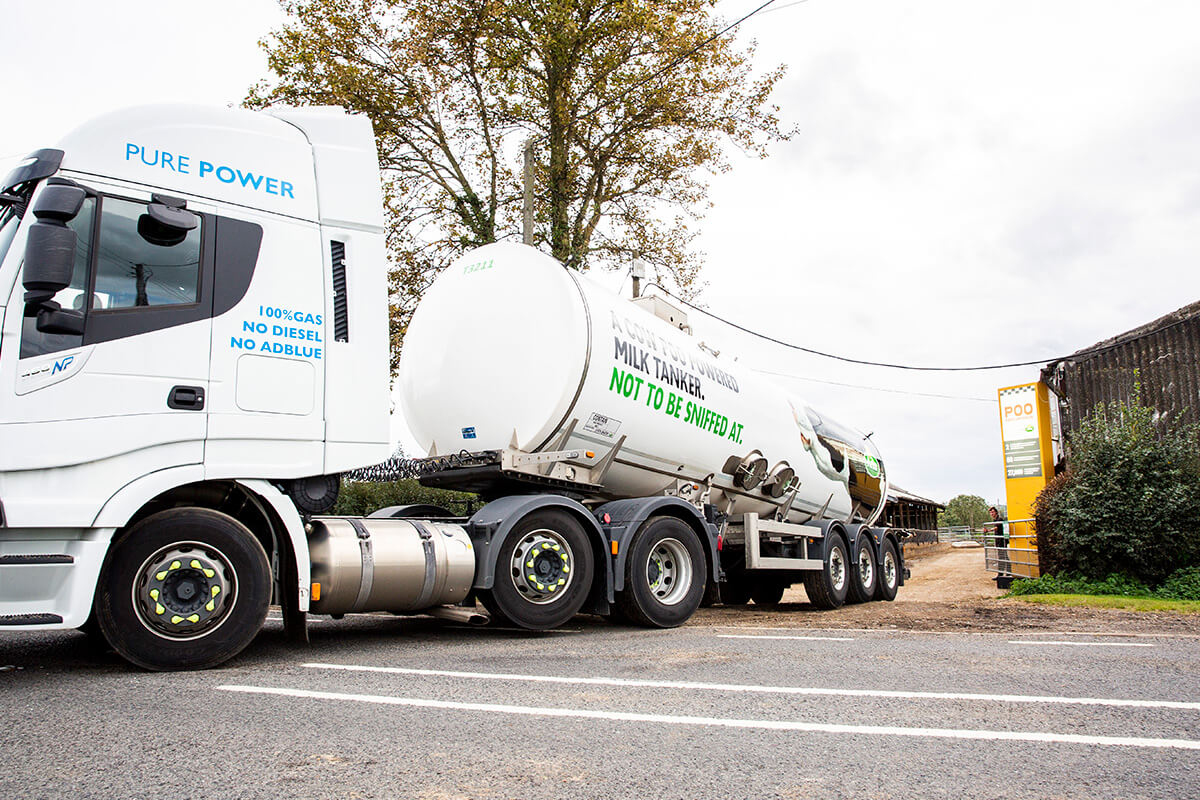 A milk truck pulling out of a dairy