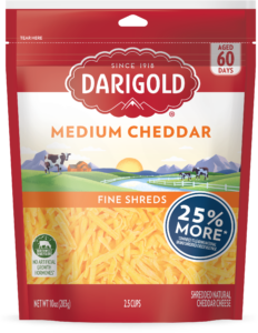 Product image of Darigold Medium Cheddar Shredded Cheese in a resealable 10 ounce bag