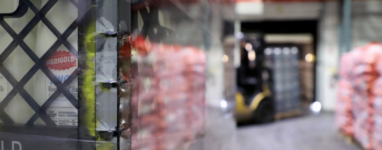 Crates of milk in a giant warehouse