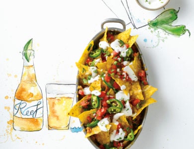 Pan of nachos with a food related illustration