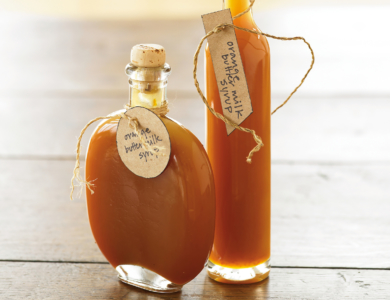 Two decorative jars of syrup
