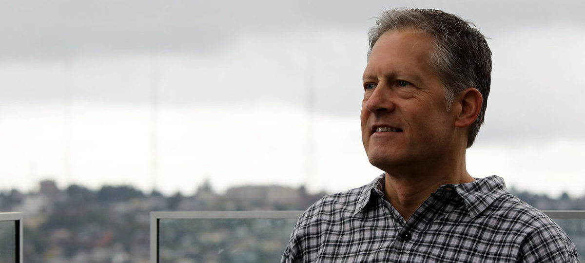 Portrait of man with city background