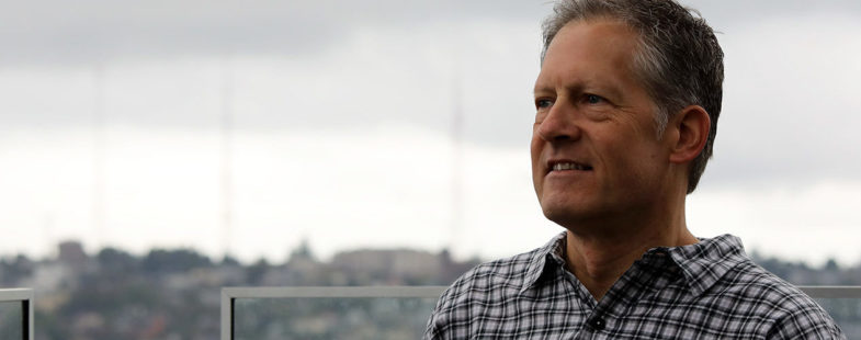 Portrait of man with city background