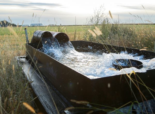 A water trough on farmland