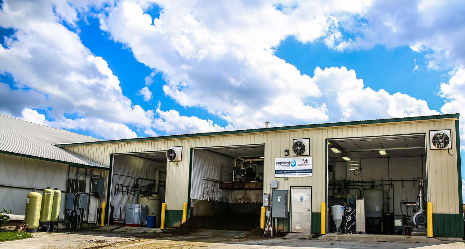 A small industrial building with three openings