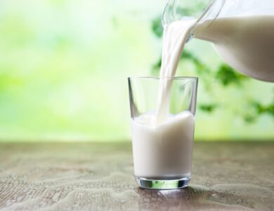 Milk being poured into a glass